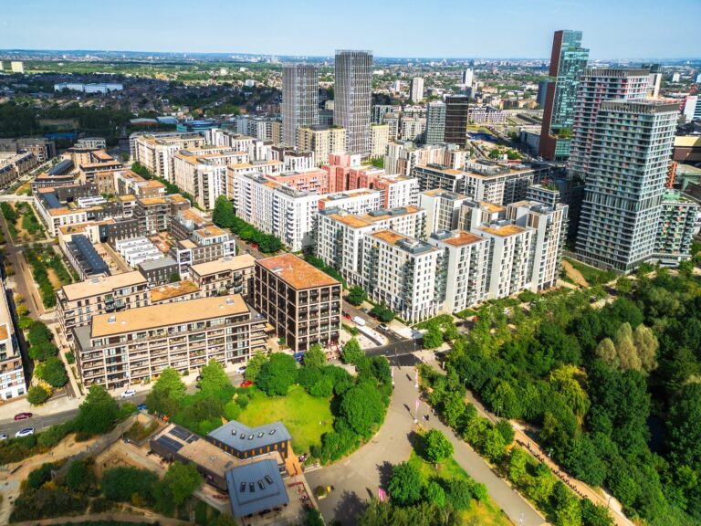 Aerial view over Stratford's East Village and the neighbouring new-build residential blocks on the former 2012 Olympic Athletes' Village site